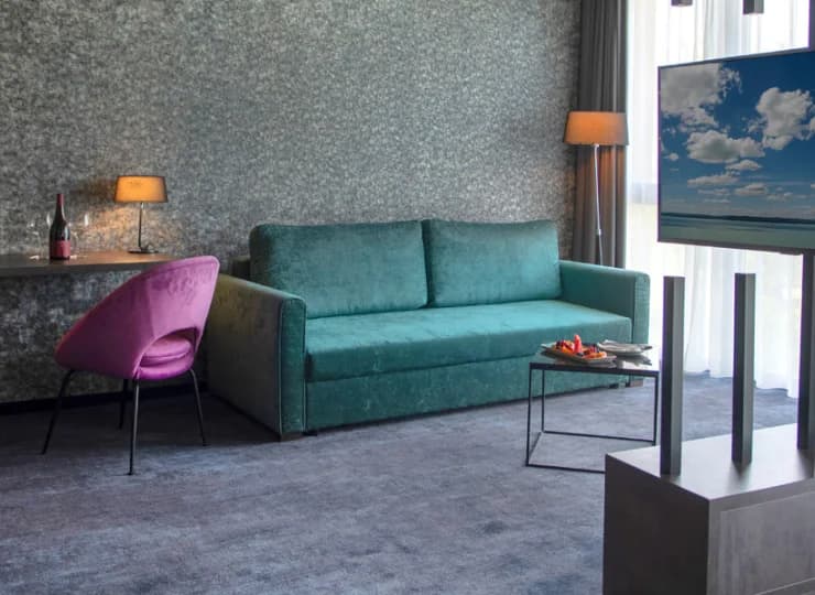Rozkładana sofa w junior suite pełni rolę dostawki dla 2 dzieci