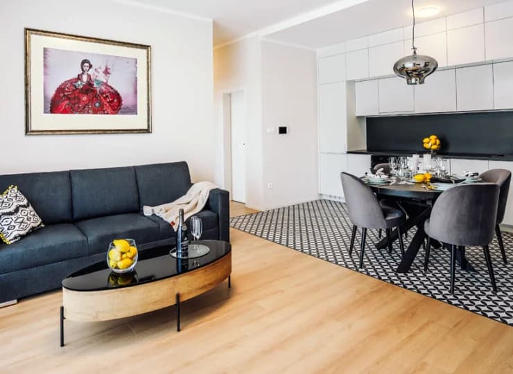 Sercem apartamentu jest pokój dzienny z aneksem kuchennym