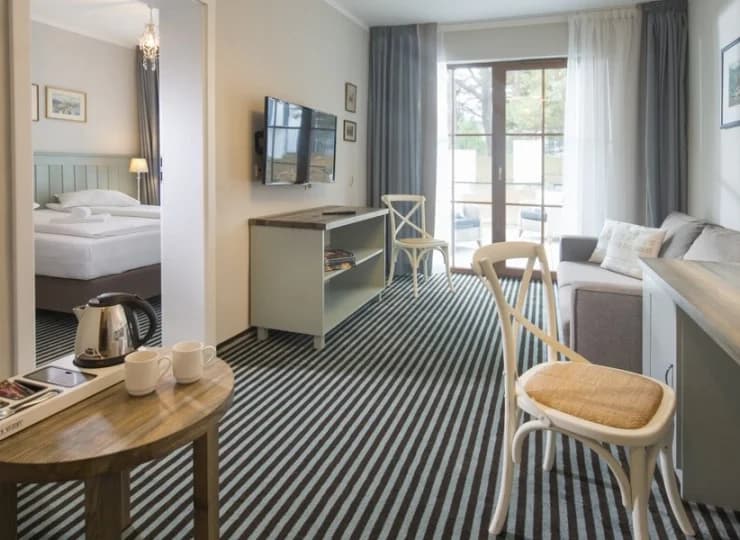 Apartament Exclusive mieści się w kameralnym budynku połączonym z budynkiem gł.