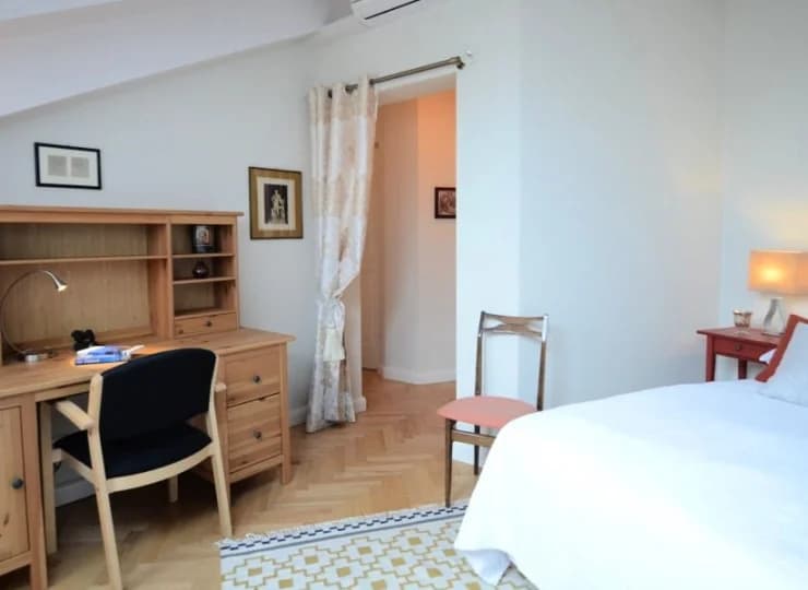 Przyjemnie urządzona sypialnia w apartamencie Deluxe