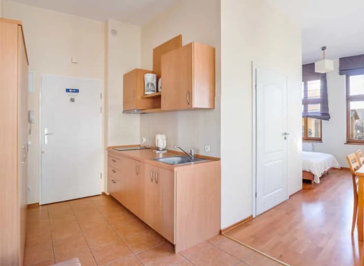 Każdy apartament dysponuje aneksem kuchennym