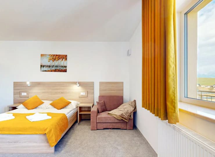 Każdy pokój ma balkon z widokiem na Tatry lub kąpielisko