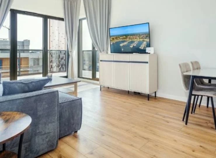 Pokój dzienny z balkonem apartamentu Komfort Plus A57