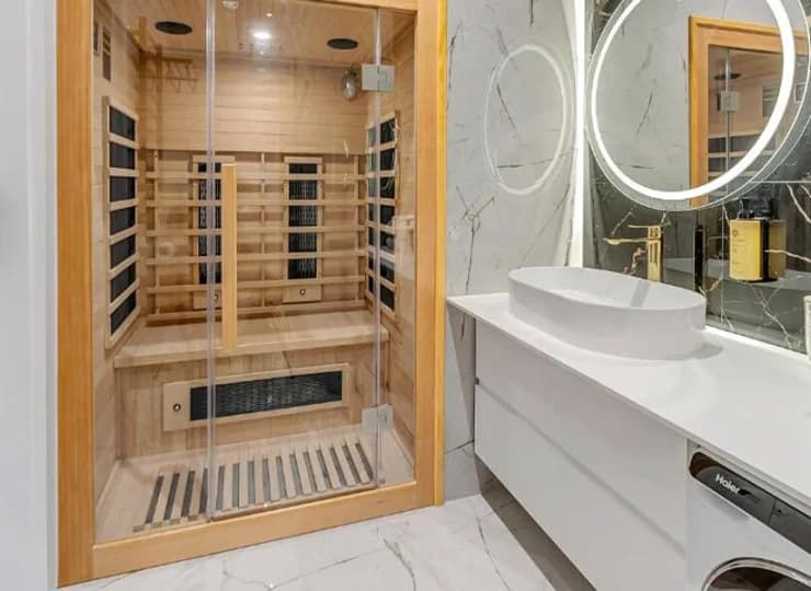 W łazience apartamentu mieści się prywatna sauna oraz pralka