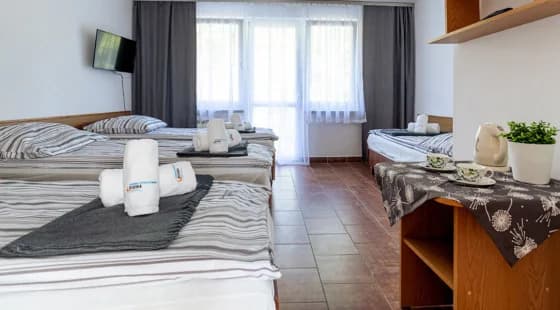 Pokój 2+2 w budynku hotelowym