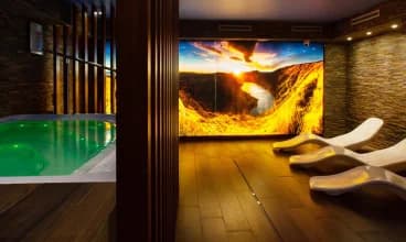Pensjonat dysponuje nowoczesną strefą wellness z jacuzzi i sauną