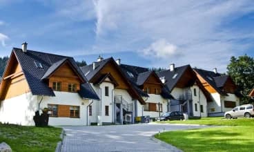 Apartamenty znajdują się w urokliwych i nowoczesnych domkach