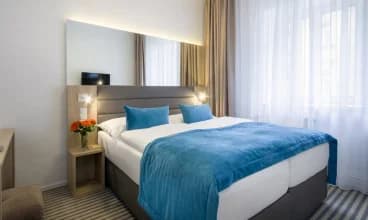 Czterogwiazdkowy hotel White Lion mieści się na prawym brzegu Wełtawy