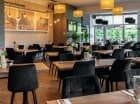 Hotelowa restauracja Atmosfera posiada wyjście na letni taras z widokiem na góry