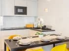 Każdy apartament posiada w pełni wyposażony aneks kuchenny