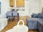 Pokój dzienny z aneksem kuchennym (apartament A53)