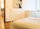 Sypialnia z podwójnym łóżkiem w Apartamencie 2+2 Superior Fusion