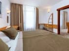 Apartamenty mają osobną sypialnię i salon