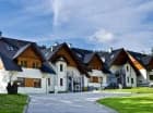 Apartamenty znajdują się w urokliwych i nowoczesnych domkach