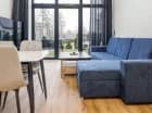Pokój dzienny z wyjściem do ogródka (apartament A05)