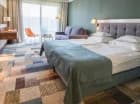 Hotel oferuje komfortowe pokoje z wygodnymi łóżkami
