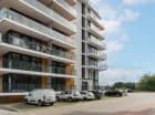Apartamentowiec posiada nowoczesną sylwetkę i dużo przeszkleń