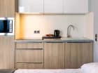 Apartamenty posiadają wyposażony aneks kuchenny