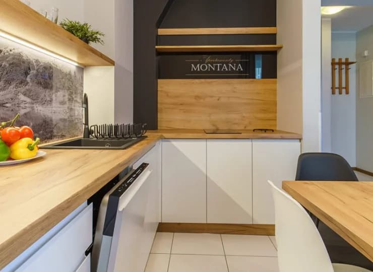 W większych apartamentach jest także zmywarka do naczyń
