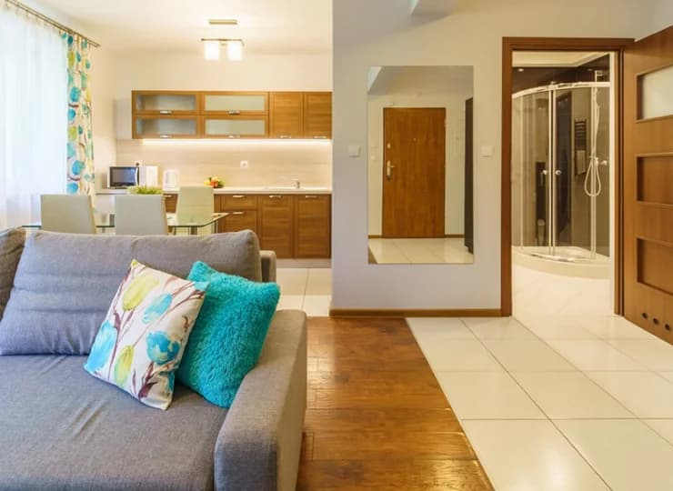 Sercem każdego apartamentu jest otwarty pokój dzienny z aneksem kuchennym