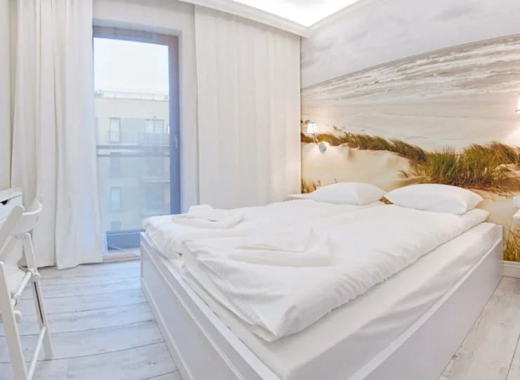 Każdy apartament posiada klimatyczną, zamykaną sypialnię z łóżkiem małżeńskim