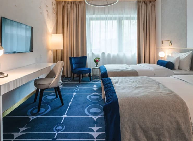 Pokój Deluxe. Wszystkie wnętrza są klimatyzowane i mają dostęp do Wi-Fi