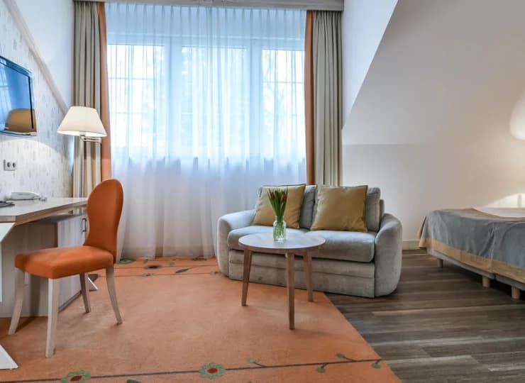 Pokoje Lux zawierają dodatkową część z kanapą