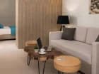 Apartament deluxe posiada rozdzieloną część sypialną i dzienną