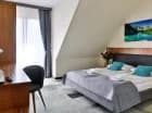 Niektóre z pokoi posiadają balkon z widokiem (m.in. na góry)