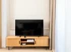 Kącik TV w apartamencie Boho