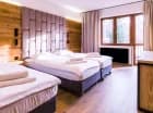 Wygodne pokoje są zlokalizowane w dwóch budynkach w standardzie hotelowym