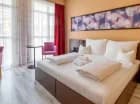 Pokoje w Hotelu Aurora są przestronne i wygodne
