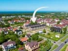 Apartamenty znajdują się zaledwie kwadrans spacerem od plaży