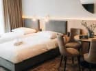 W apartamencie Junior Suite są 2 łóżka pojedyncze i 1 podwójne