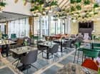 Hotelowa restauracja Winestone serwuje dania kuchni lokalnej i międzynarodowej