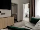 Sypialnia w pokoju deluxe grand