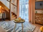 2-poziomowy apartament jak i inne pokoje urządzony został z dbałością o detale