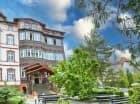 Hotel Magnolia to stylowy budynek otoczony pięknym ogrodem
