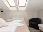 Sypialnia w apartamencie 4-os.