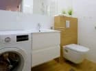 Każdy apartament ma łazienkę z prysznicem i pralką