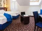 Pokoje klasy comfort mieszczą się na poddaszu budynku Mineralnego SPA